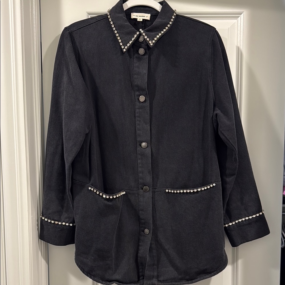 Black Jean Jacket with Decorative rhinestone Trim.   Never worn